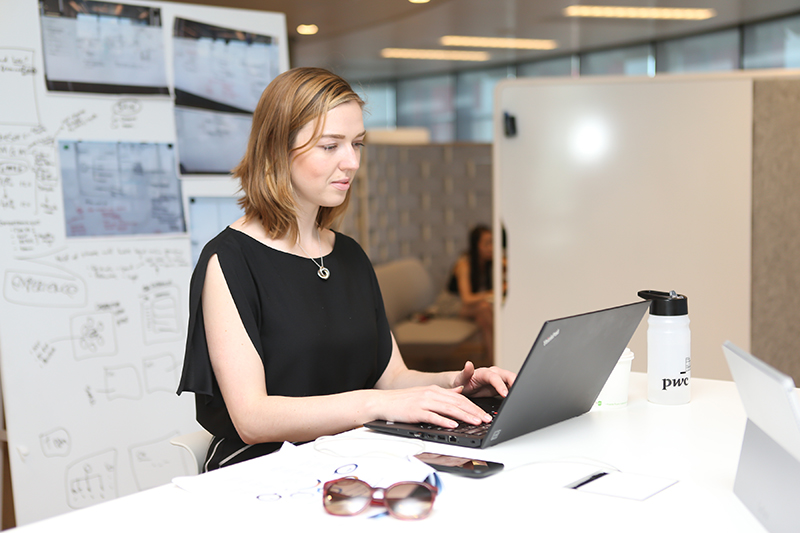 PwC Brittany Ryan at her desk