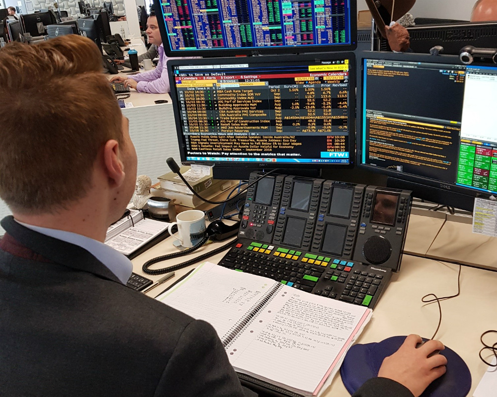 NAB Banking Graduate working on his computer