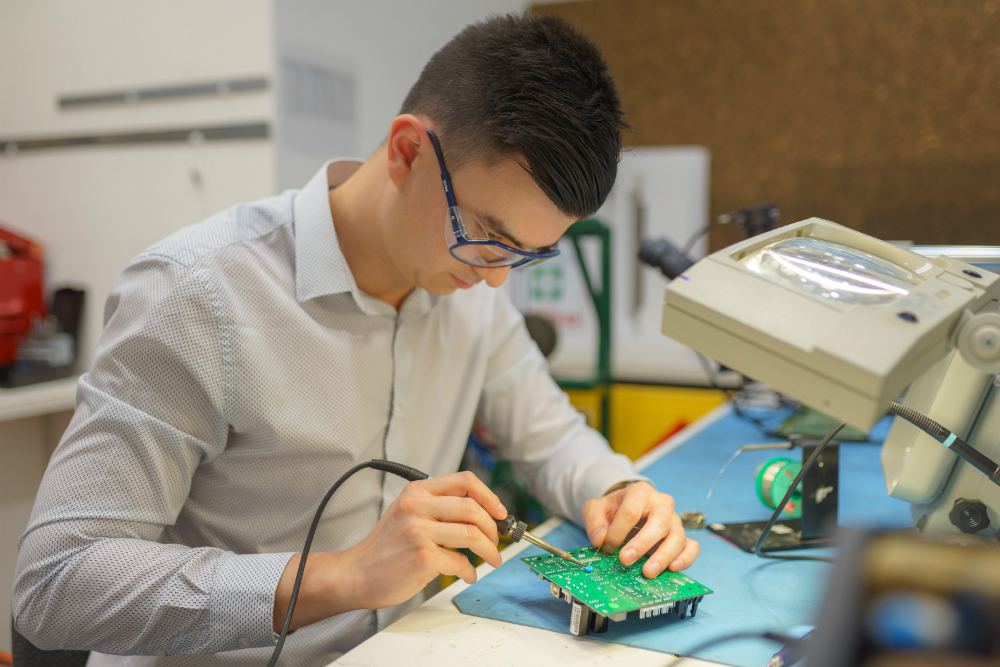 Tiernan modifying a amplifier