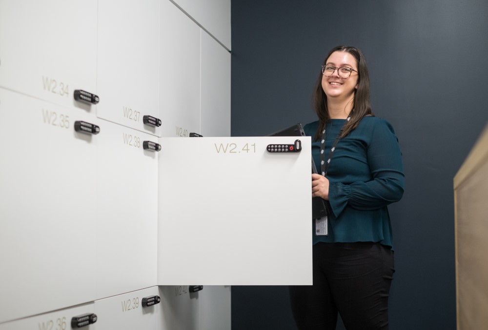 Australian National Audit Office (ANAO) Graduate - Female professional getting her things from the locker.