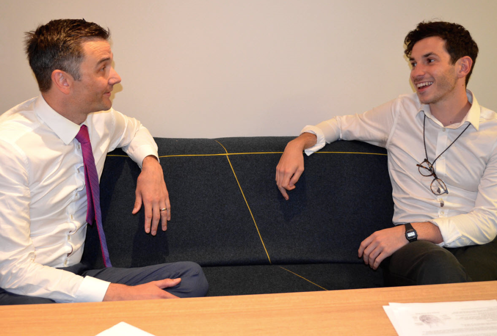 Beca Graduate- Young professional meeting with a client.