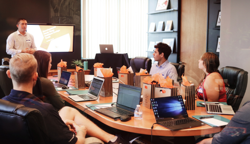 A group of human resources personnel in a team meeting