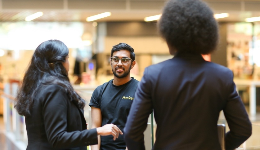 Commonwealth Bank graduates talking. 